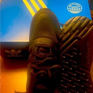 Adidas bran spanking new size three never have been worn